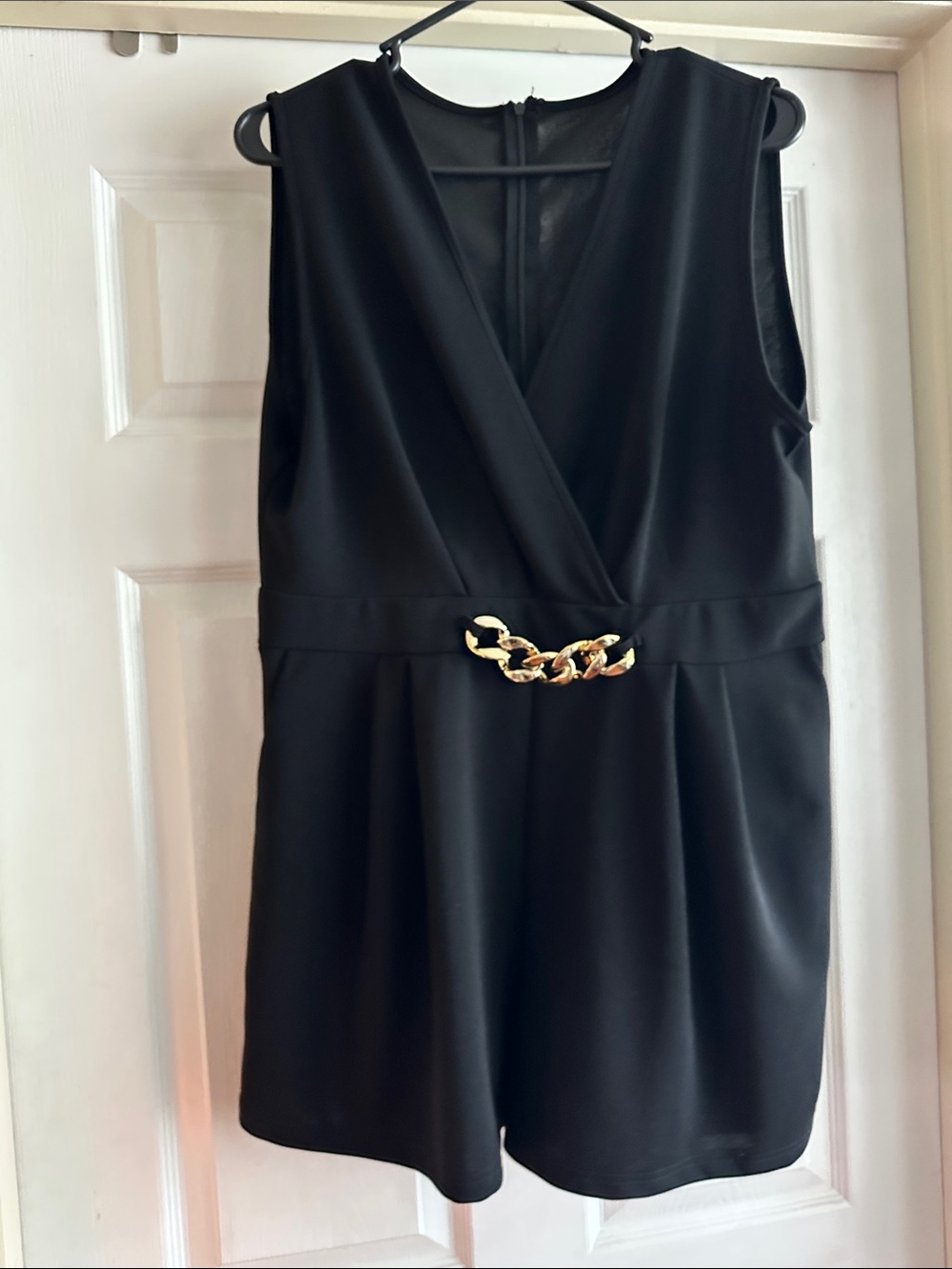Black Sleeveless V-Neck Romper with Gold Chain Detail